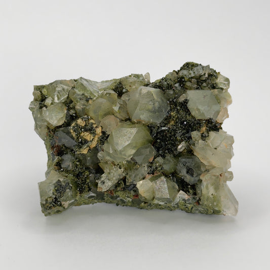 forest epidote cluster with clear quartz