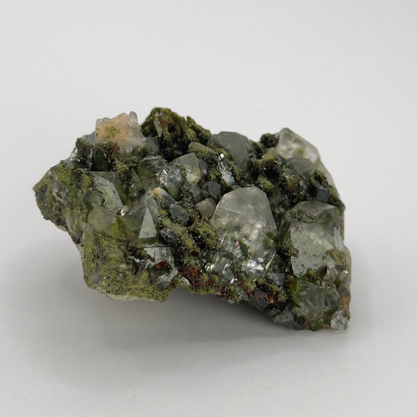 forest epidote cluster with clear quartz