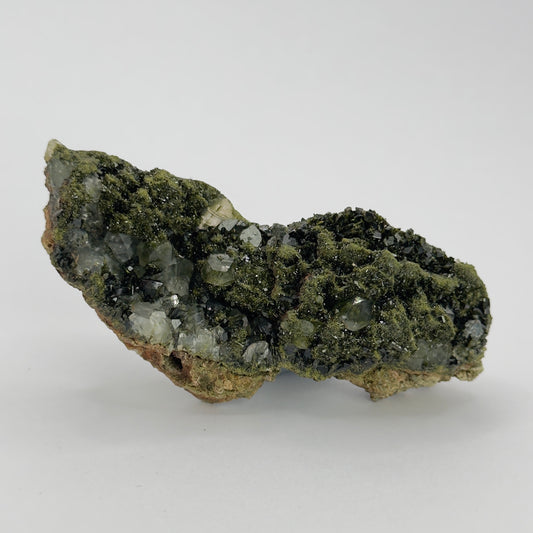 forest epidote cluster with clear quartz