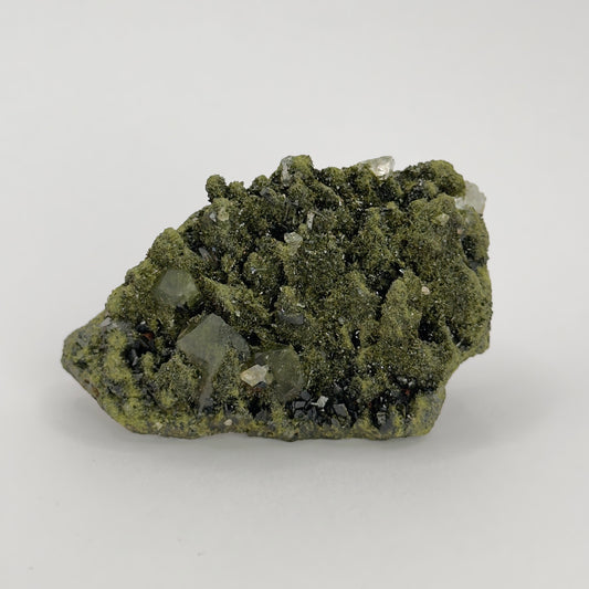 forest epidote cluster with clear quartz