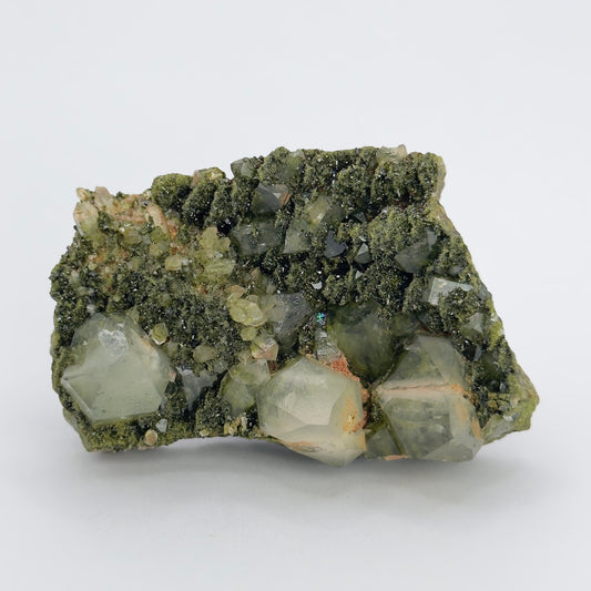 forest epidote cluster with clear quartz