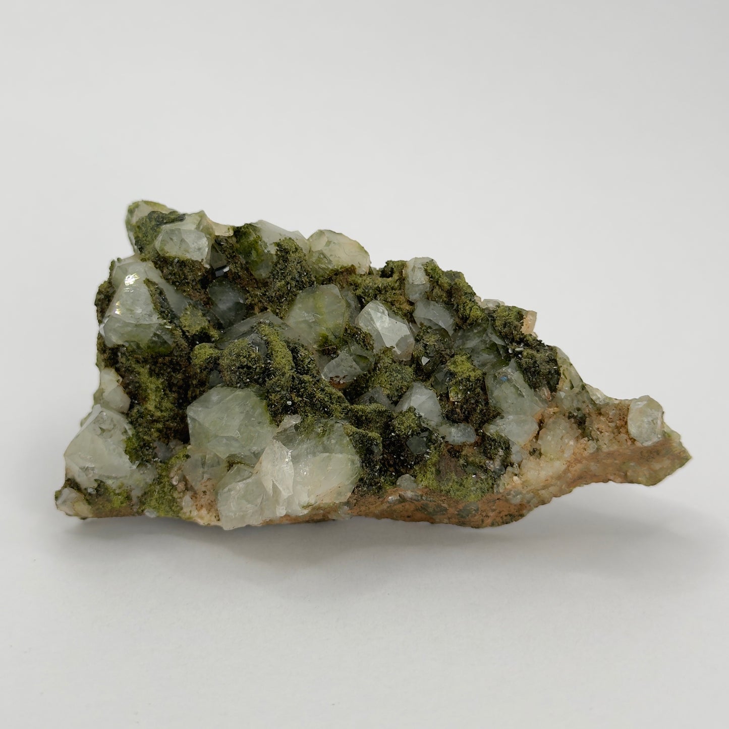 forest epidote cluster with clear quartz