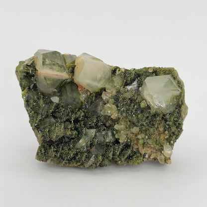 forest epidote cluster with clear quartz