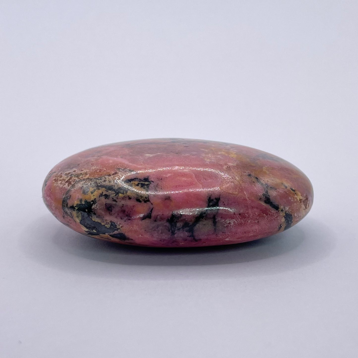 rhodonite palm stone