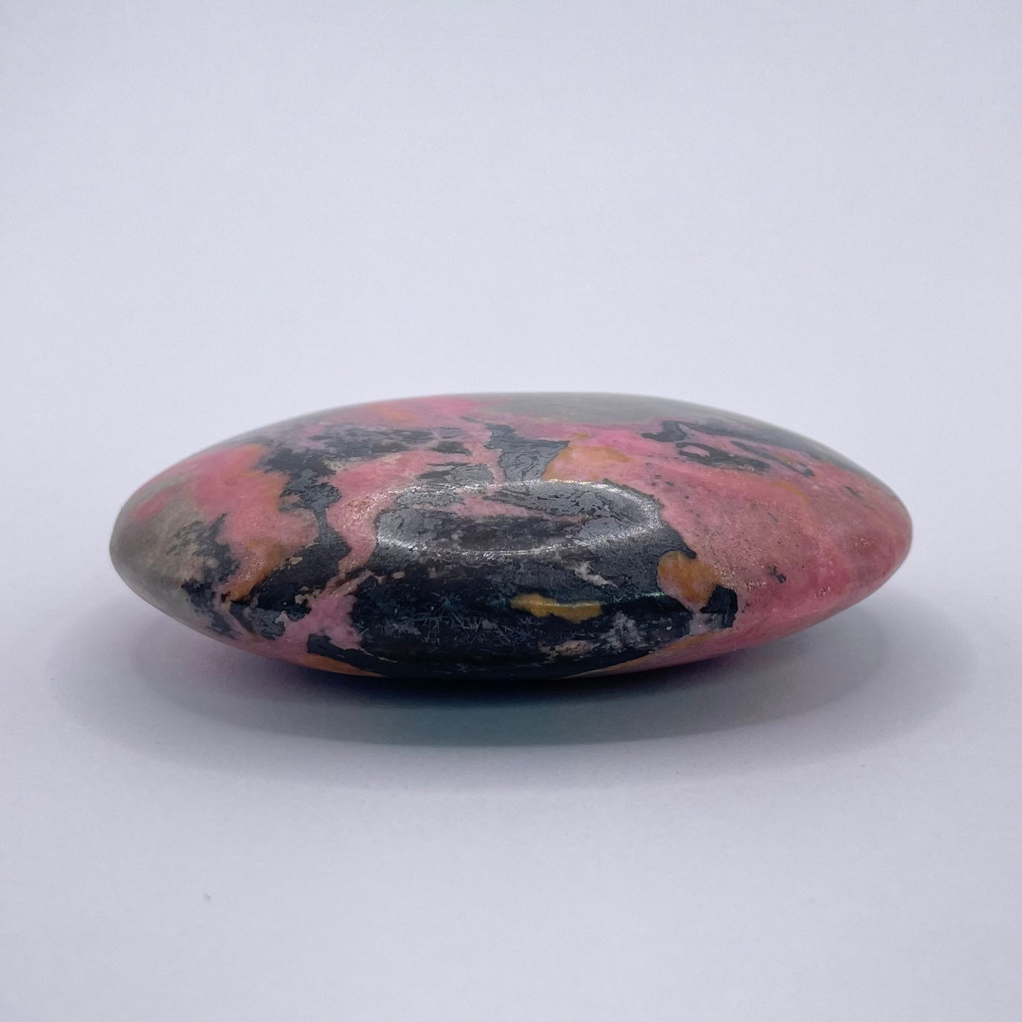 rhodonite palm stone