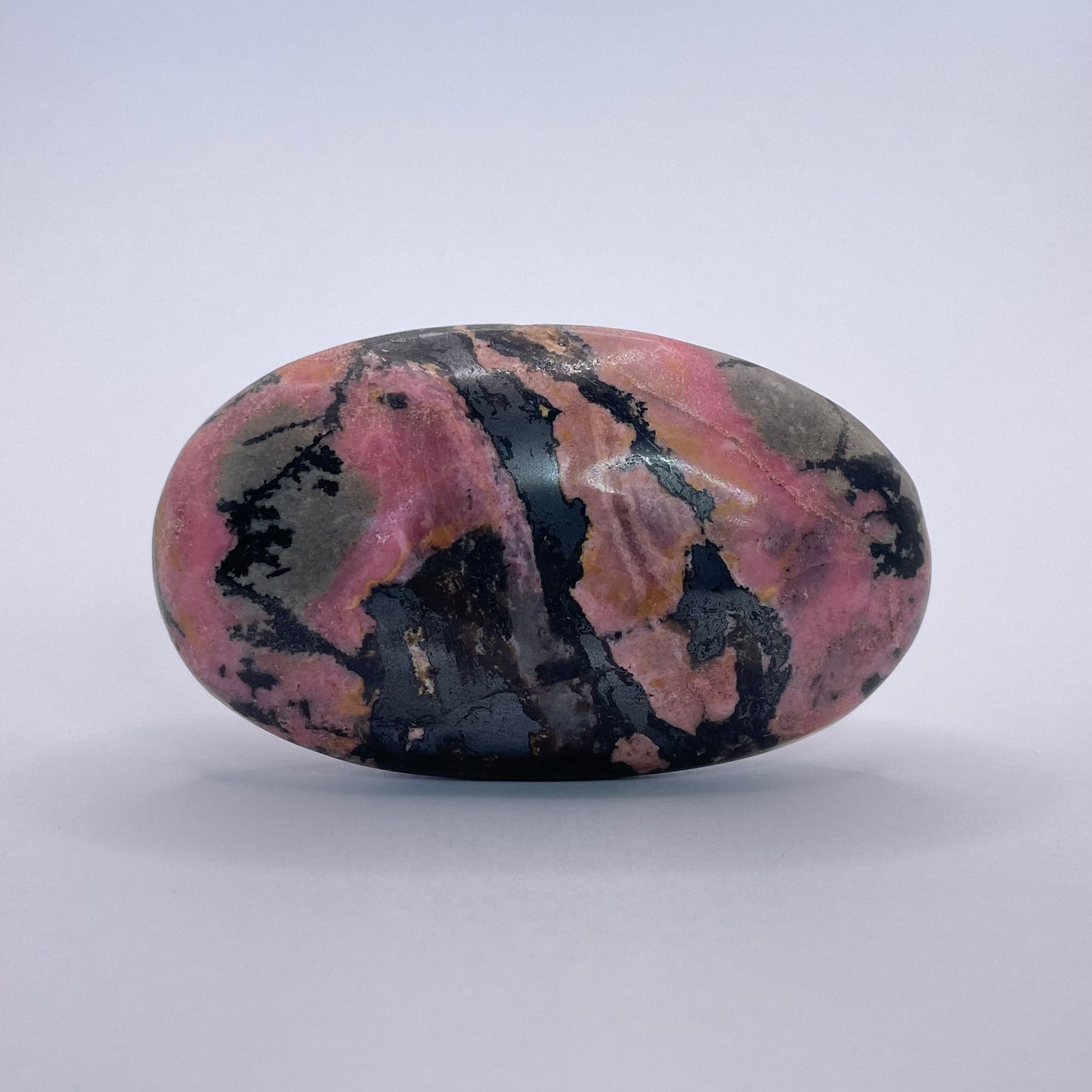 rhodonite palm stone