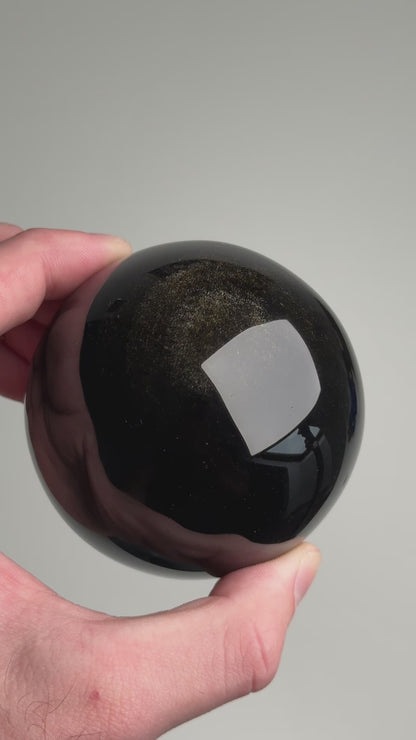 gold sheen obsidian sphere